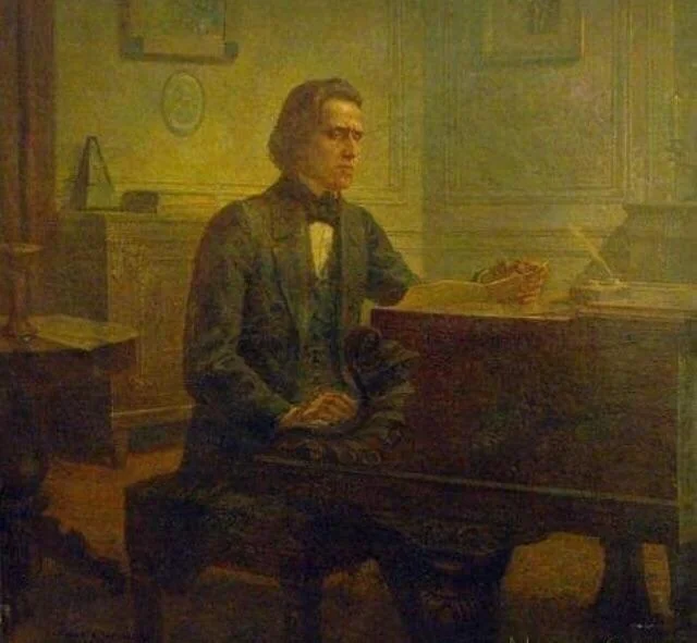 A composer at the desk in a quiet room